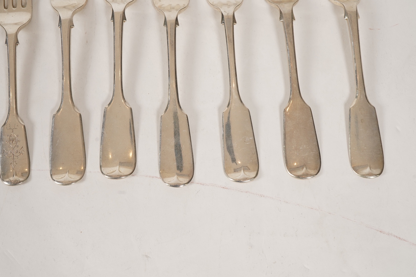A set of twelve early Victorian provincial silver fiddle pattern table forks and six dessert forks by William Rawlings Sobey, Exeter, 1838, engraved 'Susanna Kingdon'